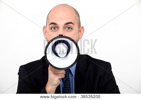 Ein Unternehmer mit einem Unterhaltungselektronik.