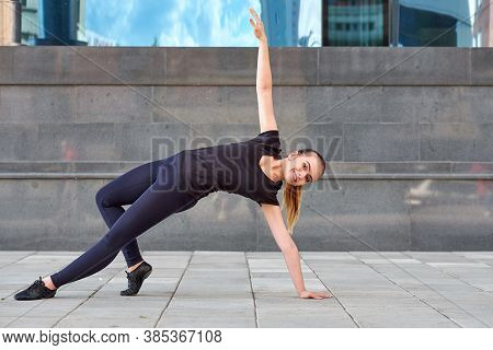 Fitness, Sport, Training, Gym And Lifestyle Concept - Stretching Young Woman In The Gym