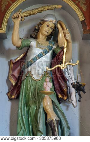 PETROVINA, CROATIA - JULY 22, 2013: Saint Michael the Archangel, altar in the Parish Church of Saint Peter in Petrovina, Croatia