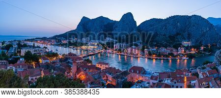 Panorama City Omis Lit At Sunset (from Mirabella Tower), Croatia, Europe.