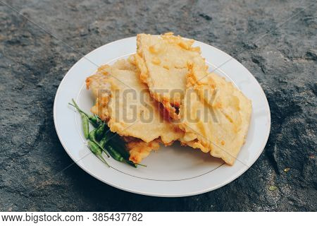 Tempe Mendoan Is A Type Of Tempeh Dish Made From Thin Tempeh, And Fried In Flour So That It Tastes T