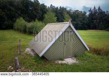 Small Green Salt Houses In The Dutch Twente Landscape With Pipes And Valves In The Houses For Extrac