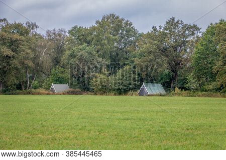 Small Green Salt Houses In The Dutch Twente Landscape With Pipes And Valves In The Houses For Extrac