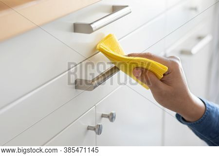 Prevention Concepts On Coronavirus ( Covid-19 ) Outbreak Situation With Person Cleaning Kitchen Furn