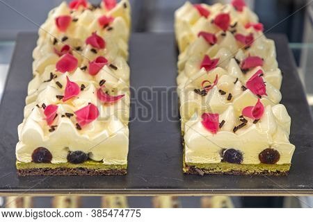 White Cakes At Slate In Patisserie Display