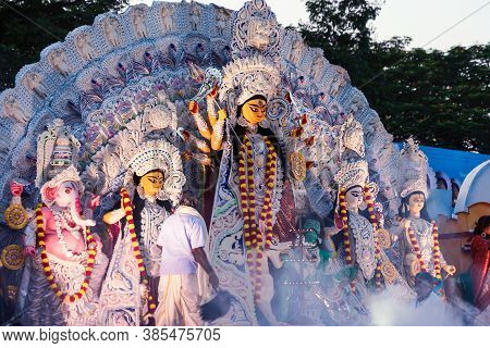 West Bengal, India, October, 2019 : People Celebrating Durga Puja. Goddess Durga Idol Going For Imme