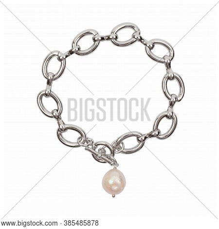 Women`s Wrist Bracelet Of Steel Chain With Baroque Pearl Pendant Isolated On White