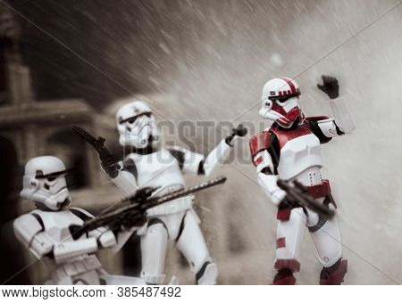 SEPTEMBER 13 2020: Imperial stormtroopers in battle with blast effect - Hasbro action figures