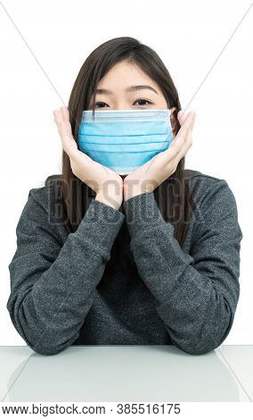 Woman Long Hair Wearing Protective Mask And Propping Up Chin With His Hands