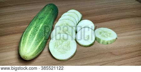 Testy And Healthy Fresh Cucumber On Tree And Cucumber Stock