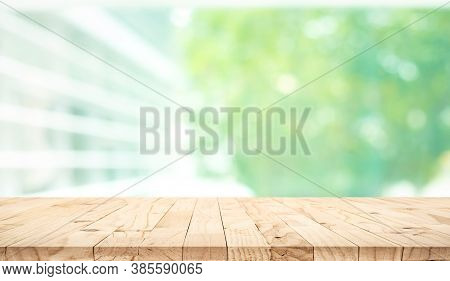 Empty Wood Table Top On Blur Abstract Green Garden From Window View Background.for Montage Product D