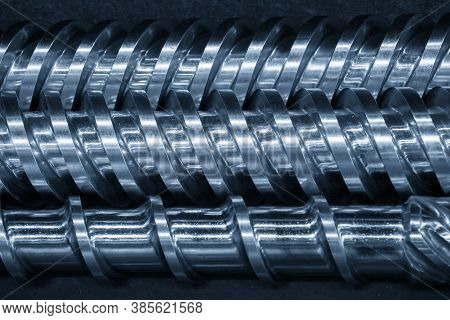 Close-up Scene Of Injection Machine Screw Spare Parts.  The Injection Machine Manufacturing Process 