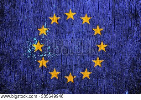 Eu Flag On Texture Background. Background For Greeting Cards For Eu Public Holidays. Europe Day Is C
