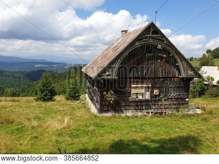 Traditional Wooden Romanian House In Marisel, Cluj County, Transylvania, Romania. Wooden Village Bui