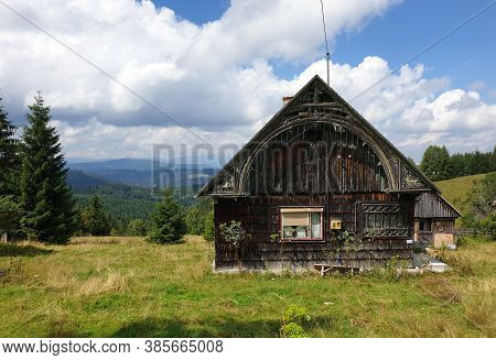 Traditional Wooden Romanian House In Marisel, Cluj County, Transylvania, Romania. Wooden Village Bui