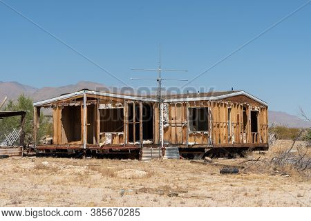 Abandoned House Camper Trailer In The Middle Of The Desert In Californias Mojave Desert, Near Ridgec