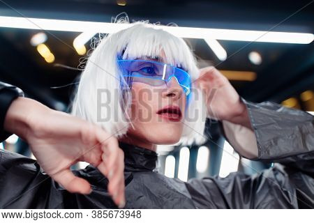 Woman In Neon Glasses. Cyberpunk And The Future
