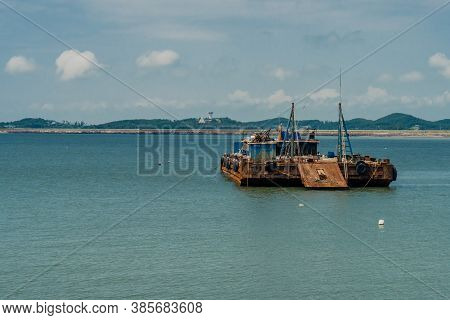 Seosan-si, South Korea; August 28, 2020: For Editorial Use Only. Large Barge Anchored In Ocean Harbo
