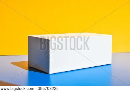 White Box. Drugs Box Mock-up. Mockup. Copy Space. Yellow And Blue Creative Minimalism Isometric Back