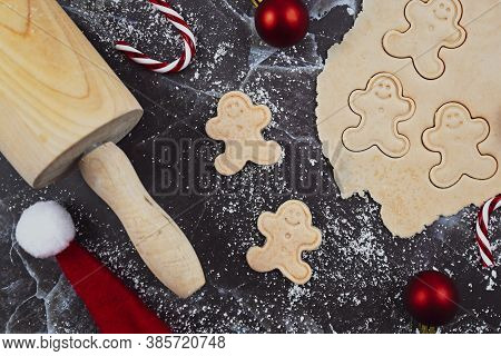 Concept For Baking Christmas Cookies With Rolled Out Cookie Dough, Cookies In The Shape Of Happy Gin