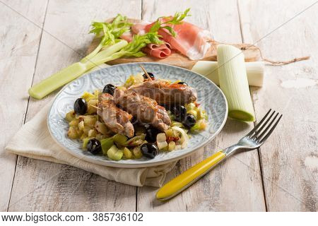 filled rolls with ham leek and black olives