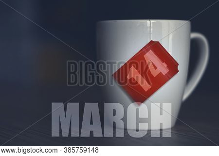 March 14th. Day 14 Of Month, Tea Cup With Date On Label From Tea Bag. Spring Month, Day Of The Year 