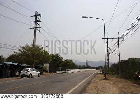 View Landscape And Traffic Road With Thai People And Foreign Traveler Driving Riding Biking On Stree