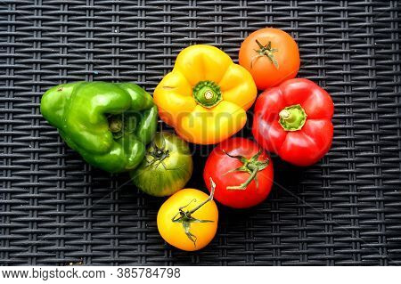 Closeup Of Fresh Vegetables. Peppers And Tomatoes