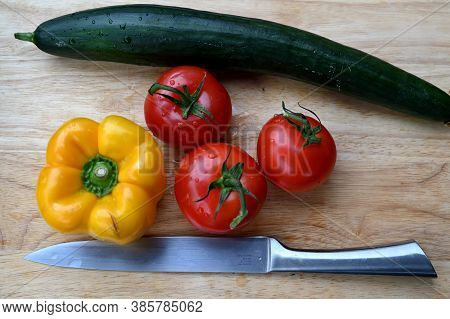 Closeup Of Fresh Vegetables On A Wooden Board