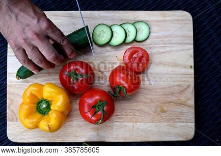 Closeup Of Fresh Vegetables On A Wooden Board.