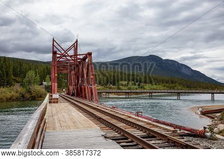 Carcross, Yukon, Canada - August 23, 2020: Historic Train Bridge In A Small Touristic Town.