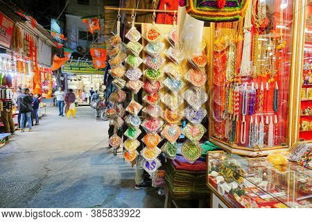 Haridwar, Garhwal, India - 3rd November 2018 : Auspicious Yellow Merchandise Hanging For Sale. At Mo