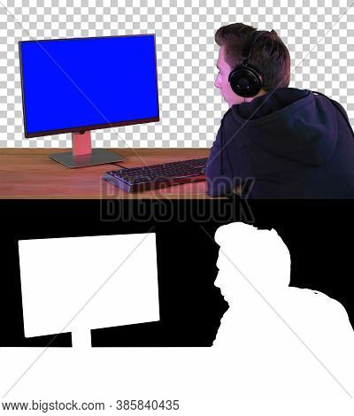 Professional Gamer Looking At His Personal Computer, Alpha Chann