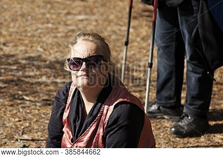 Sundsvall, Norrland Sweden - September 20, 2019: Walk In The Autumn Sun With People Who Have Down Sy