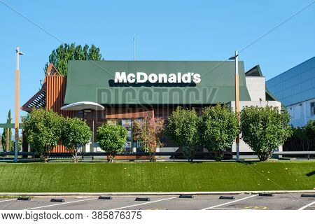 TARRAGONA, SPAIN - AUGUST 30, 2020: View of a McDonalds restaurant, with McDrive service, in Tarragona, Spain, one of the most popular fast food chains in Spain