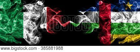 Italy Vs Central African Republic Smoky Mystic Flags Placed Side By Side. Thick Colored Silky Abstra