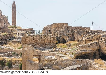 Panoramic View Of Hasankeyf Ancient Castle And The Citadel. Cave Houses And Historic Ruins In Easter