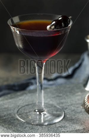 Refreshing Boozy Black Manhattan Cocktail
