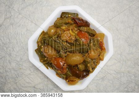 Indian Dish Bhindi Do Pyaza Top View, Ladyfinger Or Okra Home Cooked With Onions, Tomatoes And Masal