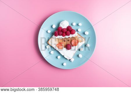 Childrens Breakfast Or Lunch, Toast Stylized In The Form Of Santa Claus With Raspberries, Strawberri