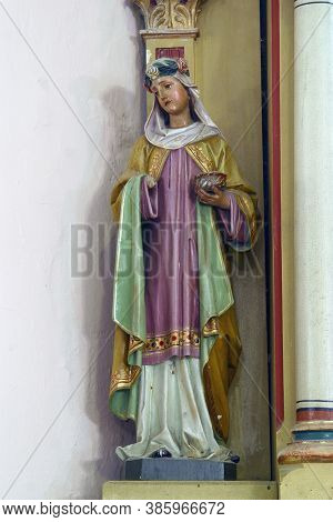 PESCENICA, CROATIA - SEPTEMBER 07, 2013: St. Lucia, statue on the altar of St. Barbara in the parish church of the Assumption of the Virgin Mary in Pescenica, Croatia