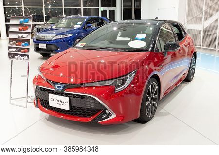 Odaiba, Tokyo, Japan - January 2, 2020: Toyota City Showcase Mega Web Palette Town - Red Toyota Coro