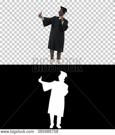 Happy African American Male Student In Graduation Robe Taking Ph