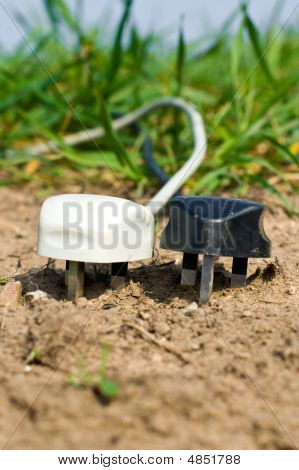 Dois terra plugues, electricidade verde