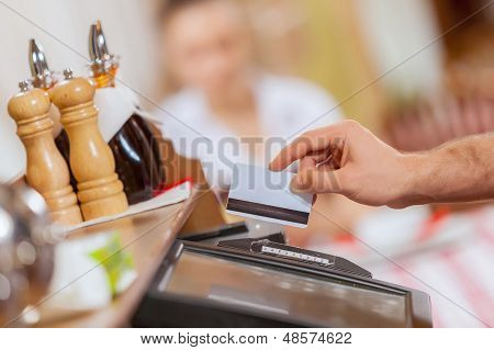 Close-up of cashier hands