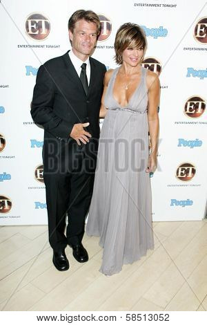 WEST HOLLYWOOD - AUGUST 27: Harry Hamlin and Lisa Rinna at the 10th Annual Entertainment Tonight Emmy Party Sponsored by People in Mondrian August 27, 2006 in West Hollywood, CA.