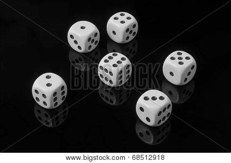 White Dice On Black Background