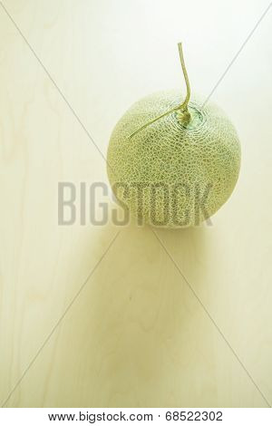 Cantaloupe melon over wooden