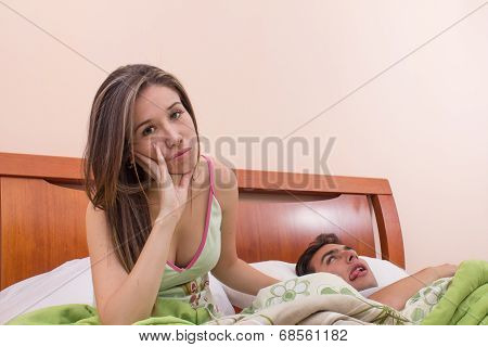 annoyed wife of hungover husband