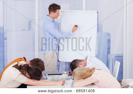 Colleagues Getting Bored During Business Presentation